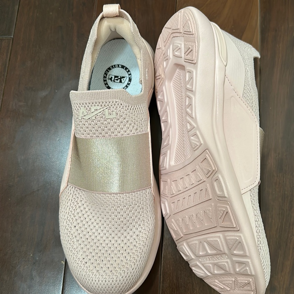 APL sneakers for women size 7.5 US brand new not with tags but never used.